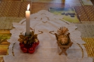 Ołtarzyk kolędowy, Dzieciątko Jezus w żłóbku, zapalona świeca